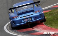 Kevin Estre con el Porsche 911 GT3 Cup, durante la prueba de la Porsche Carrera Cup alemana de 2013 disputada en el circuito de Oschersleben.